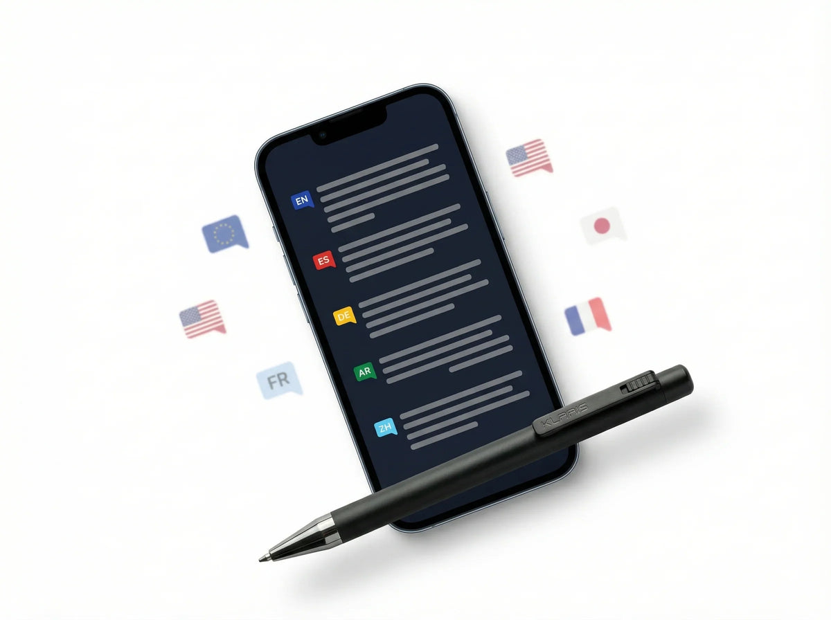 Smart AI note-taking pen KlarisPen next to smartphone displaying multilingual transcription app