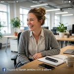 Smiling woman in office with a smart AI note-taking pen on notebook at desk